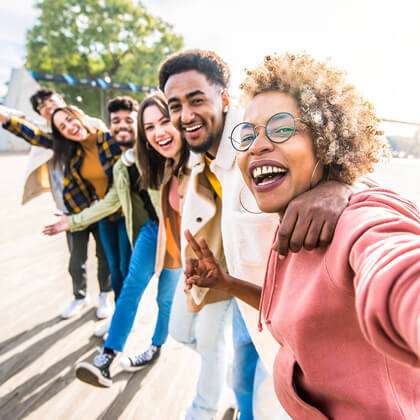 Group selfie with multiracial friend group