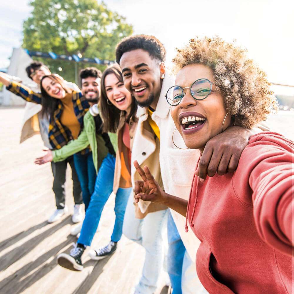 Group of multiracial friends take a selfie