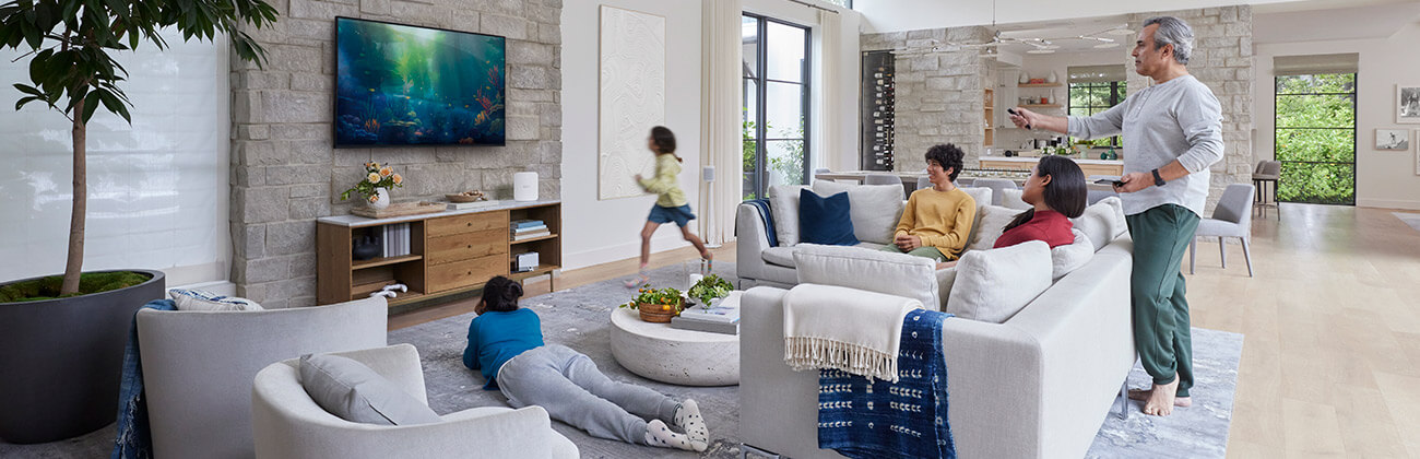 family watching tv in their living room